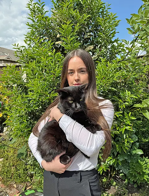 Splodge back home with Molly after treatment at Northwest Veterinary Specialists.